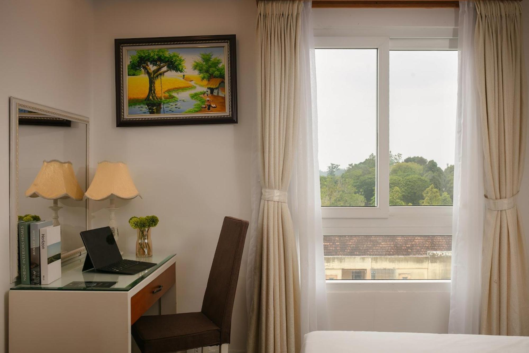 Nesta Hotel Кан То Екстериор снимка