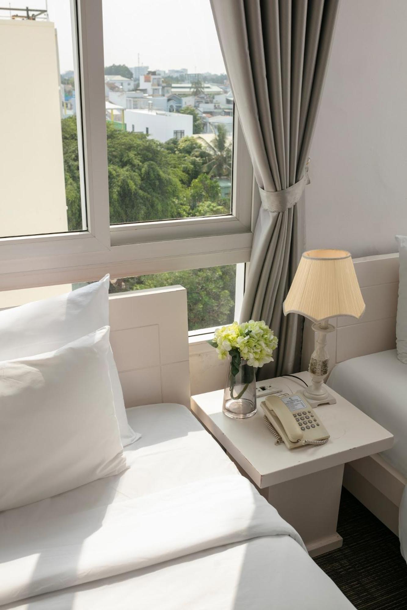 Nesta Hotel Кан То Екстериор снимка